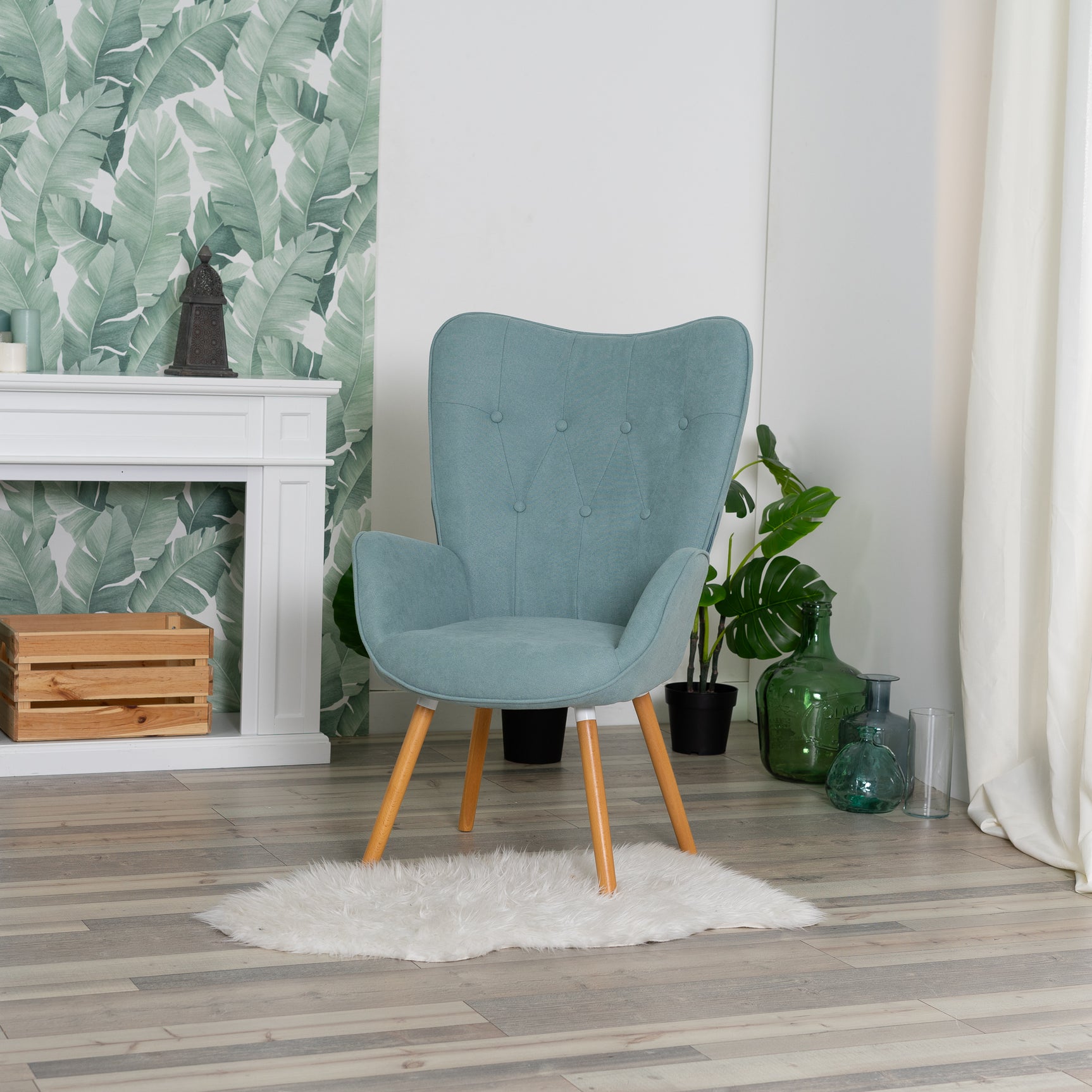 Fauteuil scandinave avec accoudoirs en tissu vert d'eau capitonné - KAS