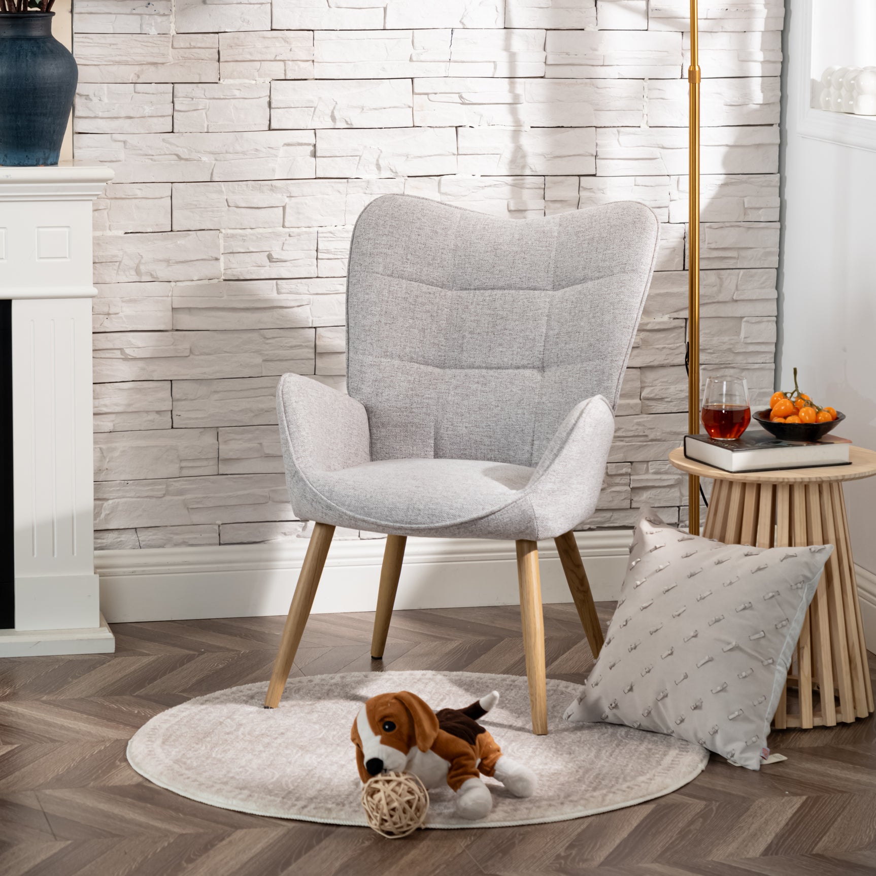 Scandinavian armchair with armrests in gray fabric with stitching - KANAS